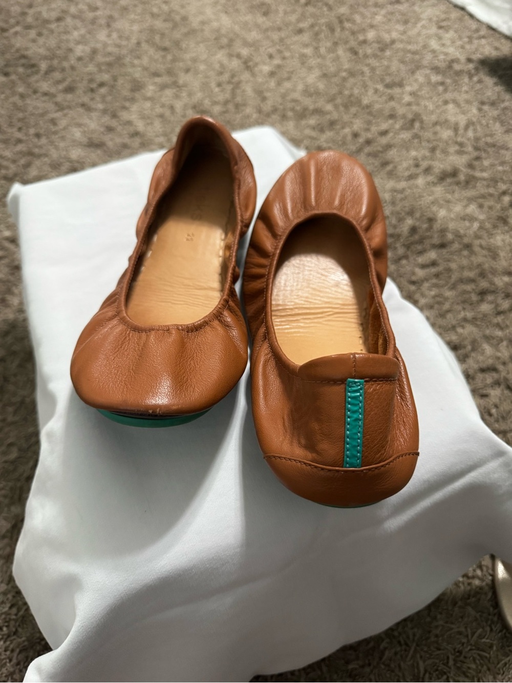 TIEKS - Brown/Tan leather.